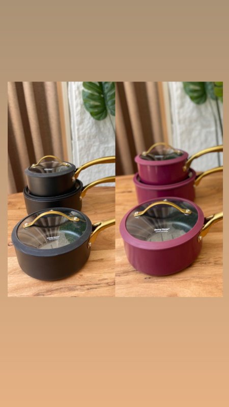 طناجر مع يد ذهبية